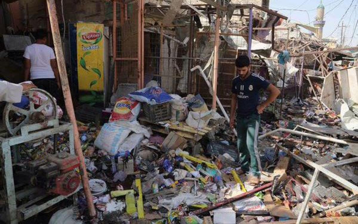 Two suicide attacks in Baghdad kill at least 14 people