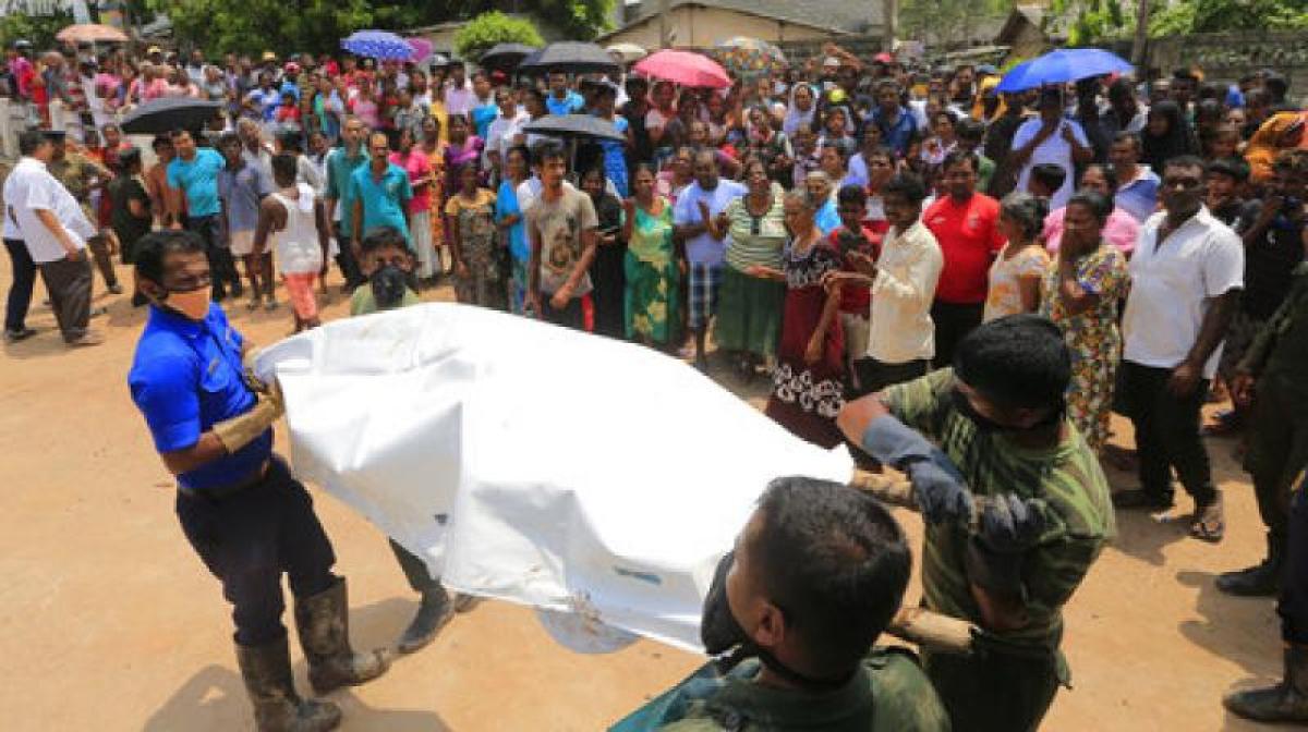 Sri Lanka relocates hundreds of families post collapse, toll 26
