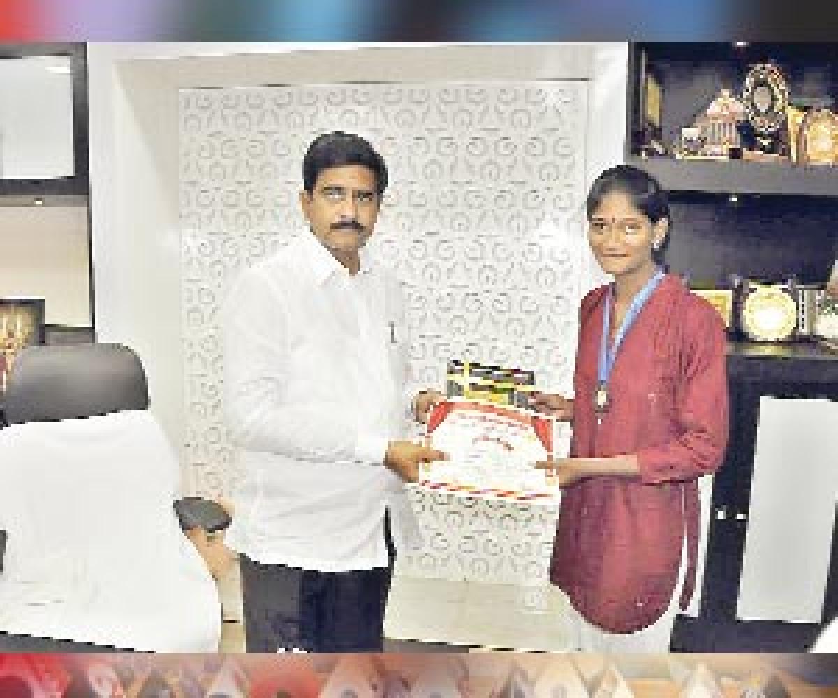 Yoga meet medal winner feted