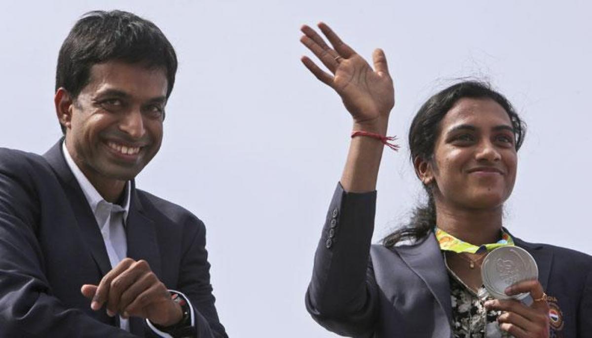 Sindhu receives a rousing welcome at Vijayawada