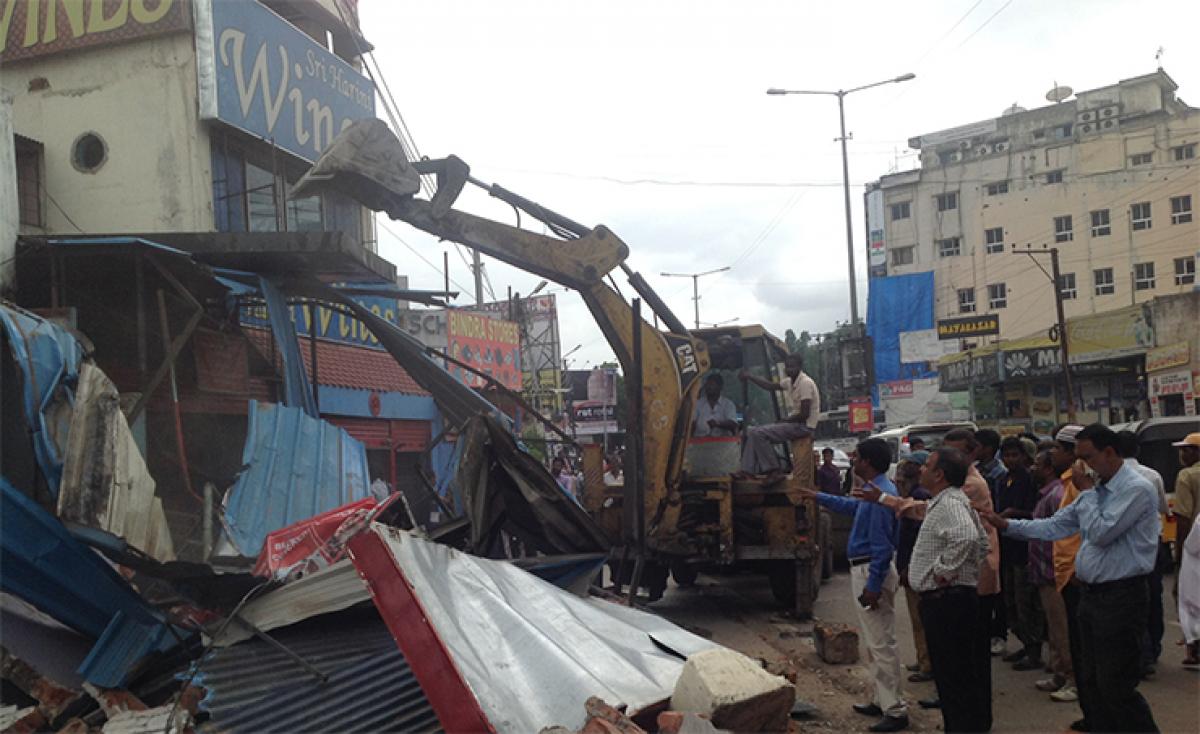 Encroachments abutting Karimnagar highway demolished