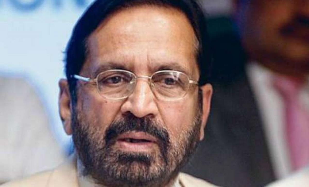 Kalmadi backs off, Chautala defiant