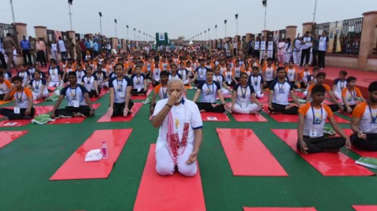 Yoga is cheap health insurance, says PM; kicks off 3rd Intl Yoga Day in UP