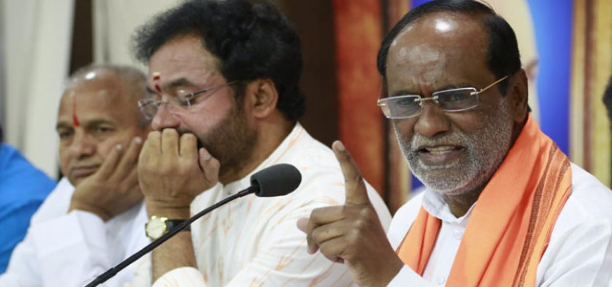 BJP throws challenge to TRS