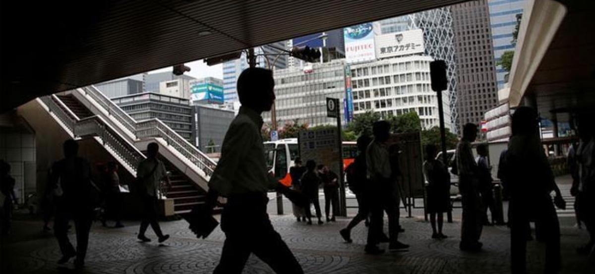 Japan Q3 GDP slashed as capex, inventories shrink