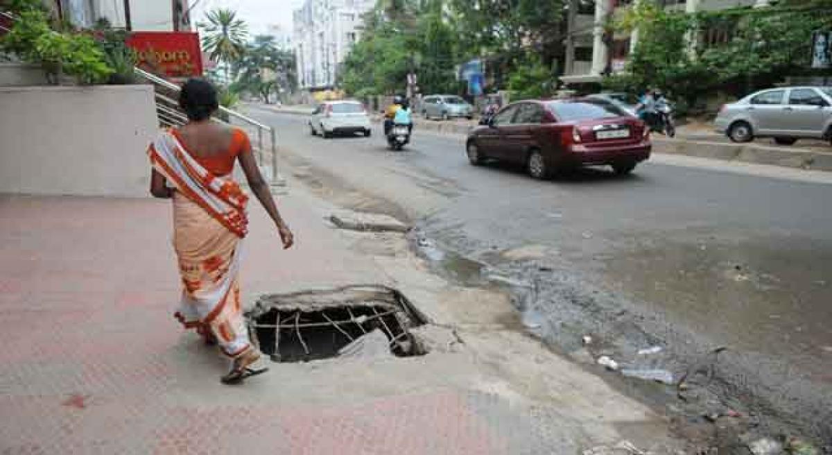 Oh God, save us from this open manhole