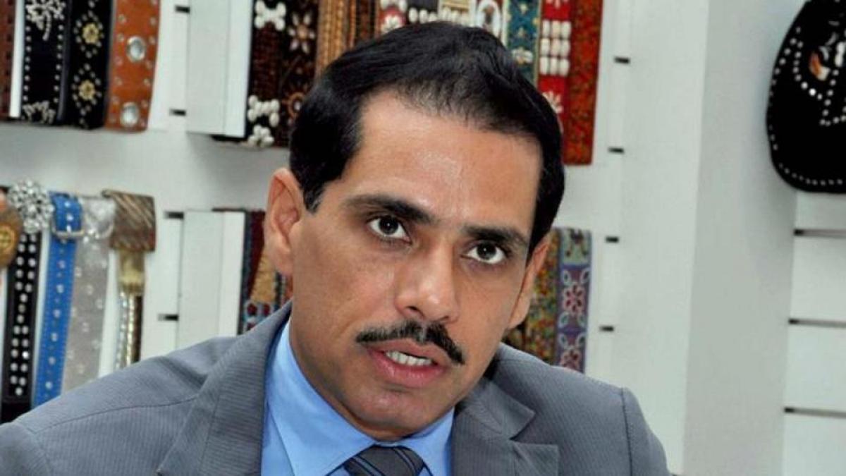 Modis raincoat jibe on Manmohan extremely demeaning: Robert Vadra