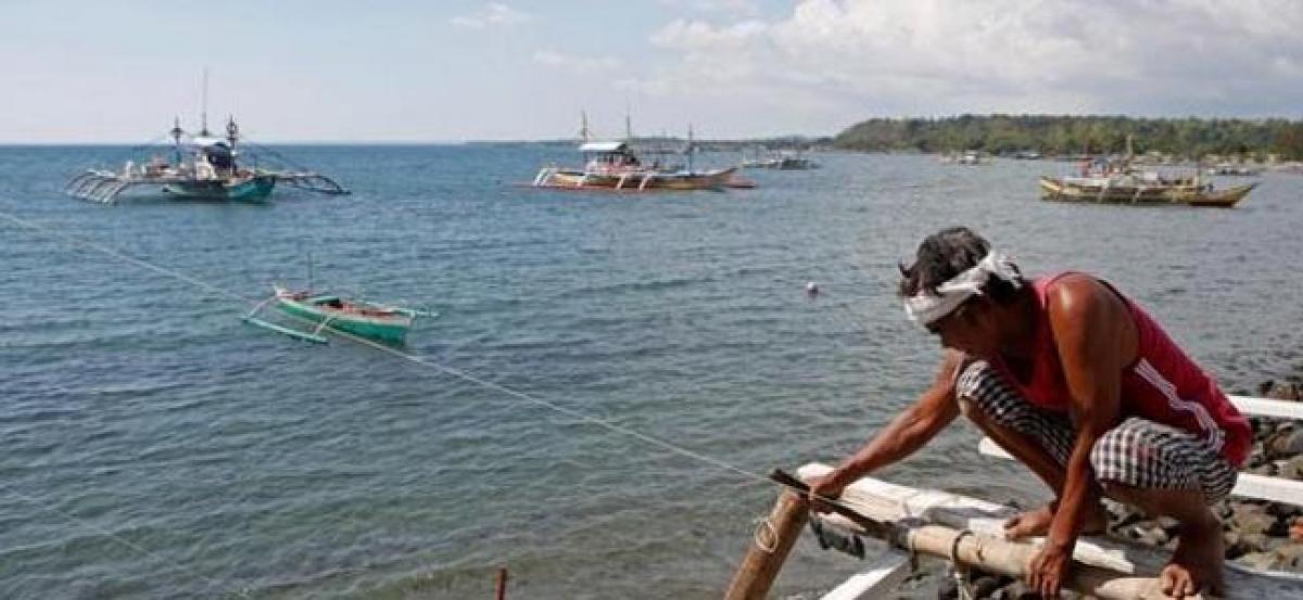 China may give Filipino fishermen access to Scarborough - sources