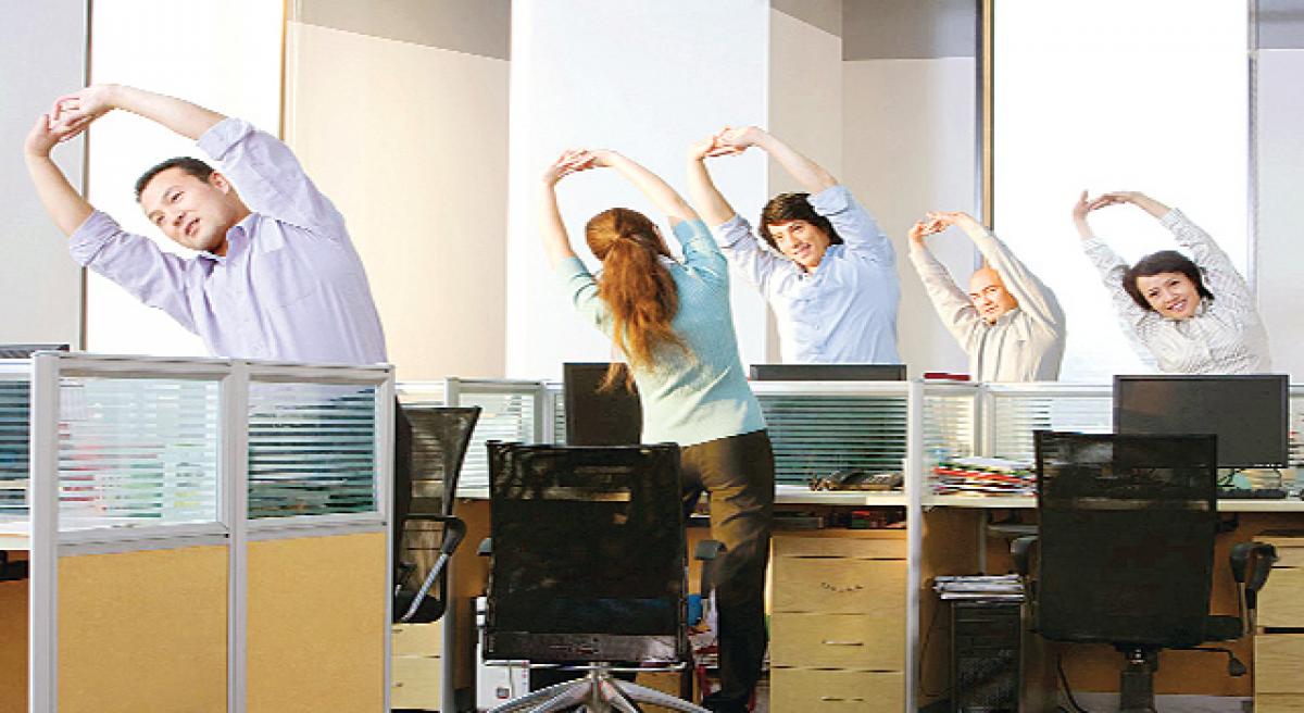 Use sit-stand desk in office to reduce weight