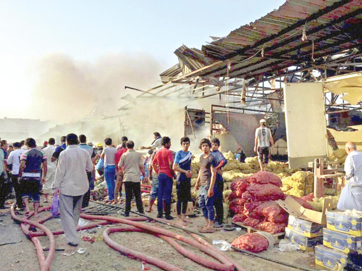 IS truck bomb kills 67 at Baghdad market