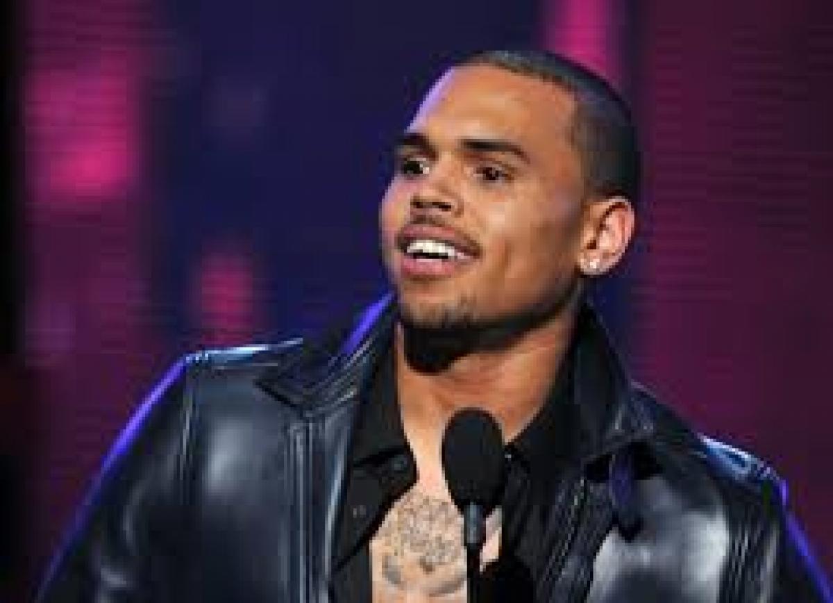 Chris Brown still learning how to be a dad