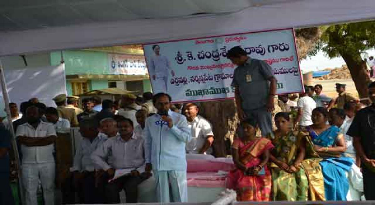 KCR rains sops on two adopted villages