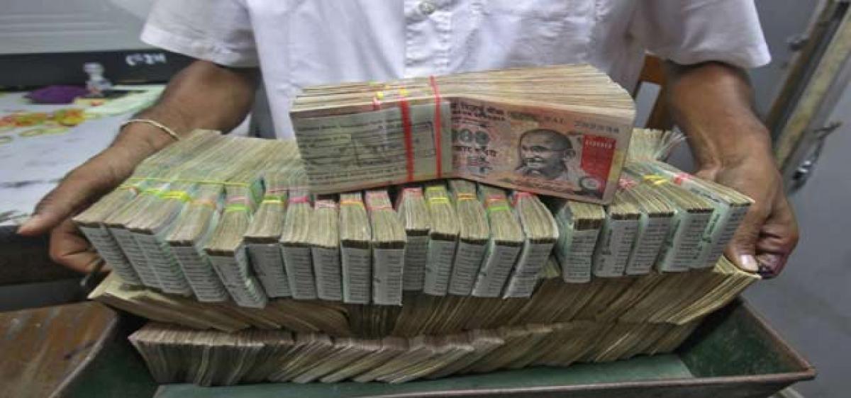 Touts working overtime to help traders in black money conversion