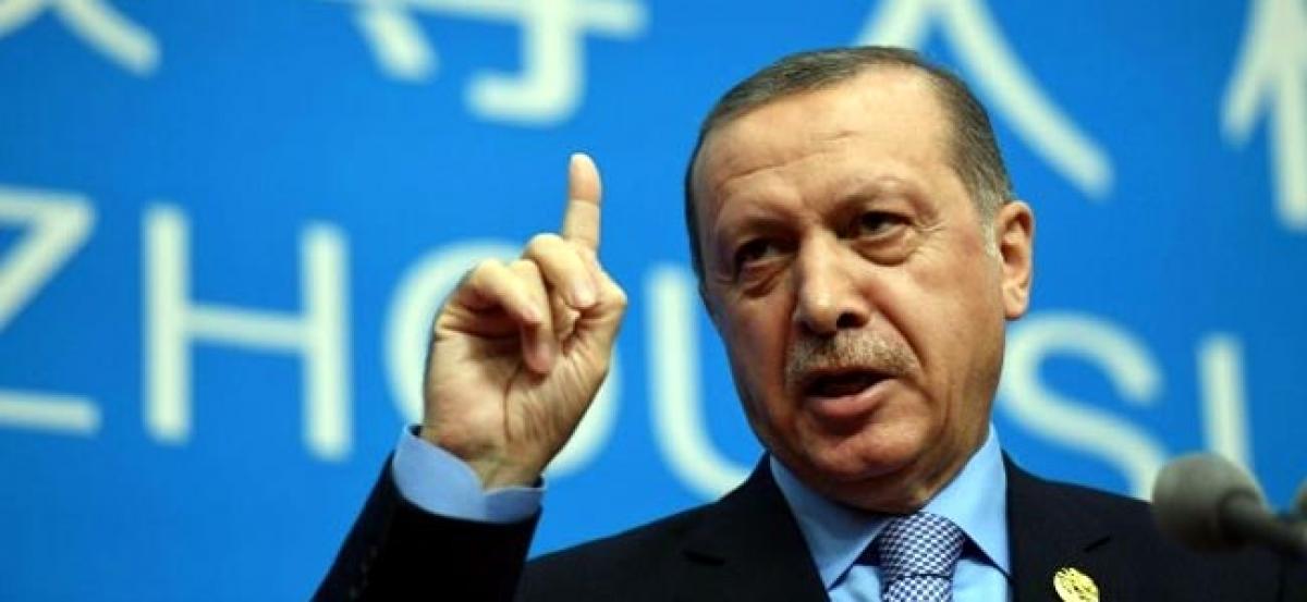 Turkish President Erdogan says Istanbul nightclub attack being exploited to divide Turks