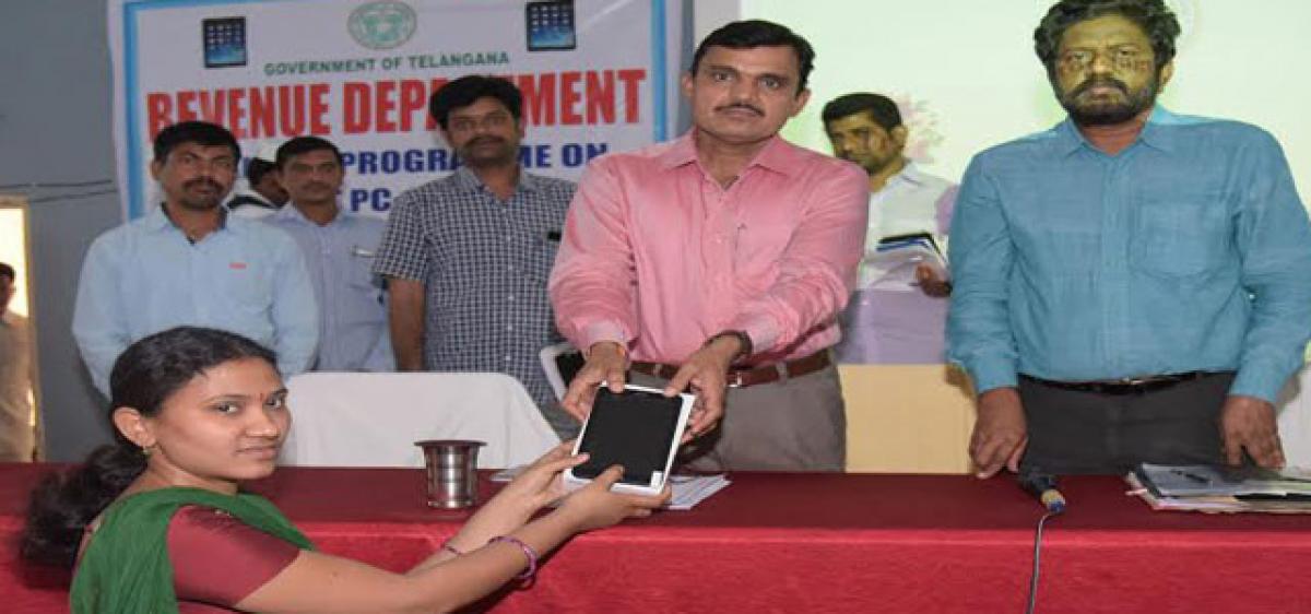 Tablets distributed to VROs in Jagtial