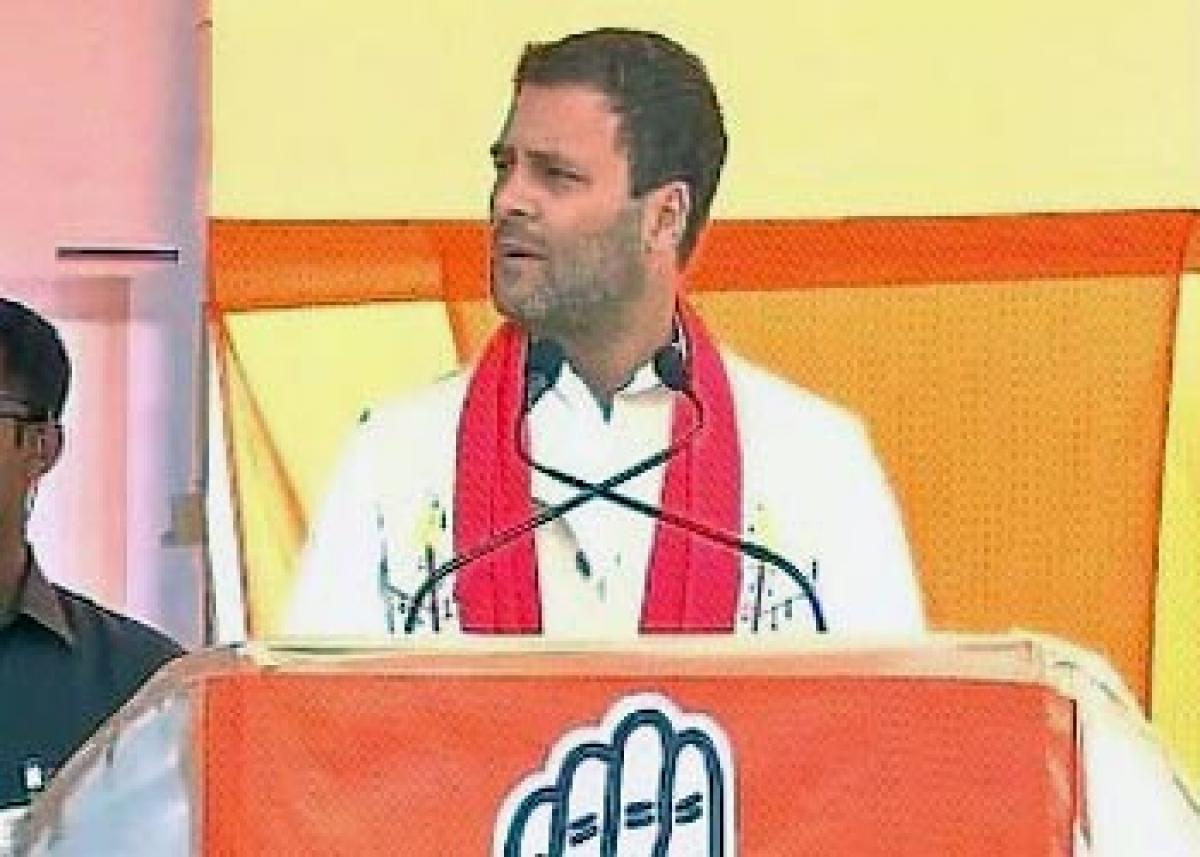 In Gogois bastion, Rahul questions PM Modis promises