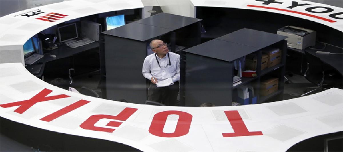 Japan stocks open lower after recent gains