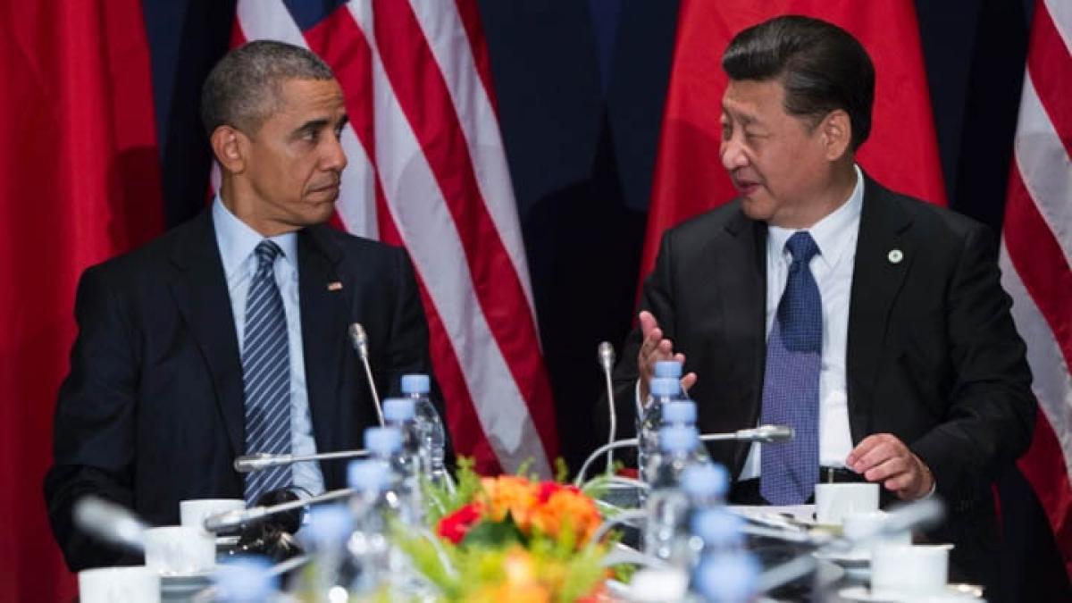 Obama talks ISIS, cybersecurity with Jinping at COP21