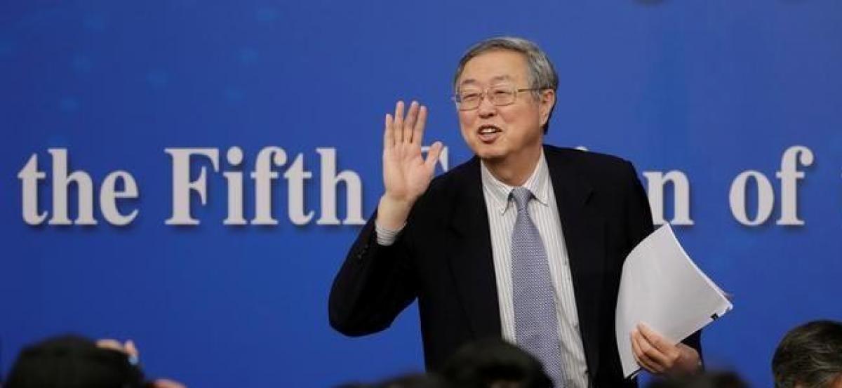 China corporate debt levels excessively high, no quick fix- central bank governor