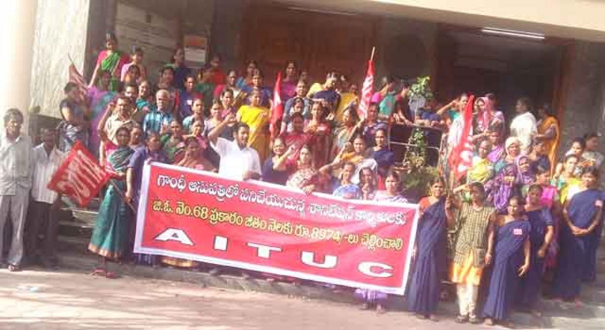 Telangana Govt hospital sanitation contract workers dharna enters fourth day