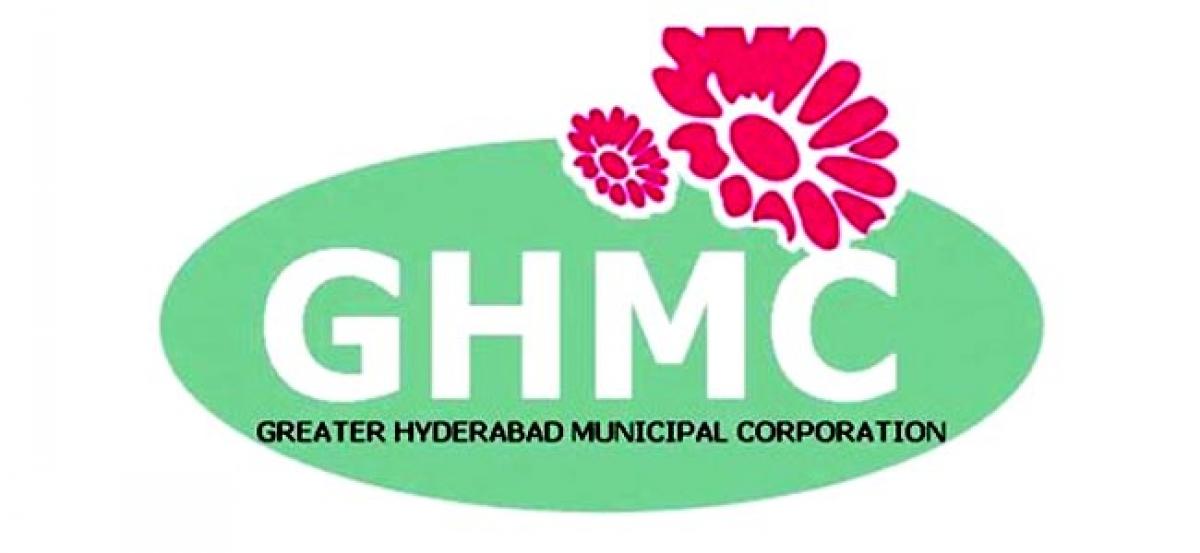 GHMC official allegedly caught while taking bribe