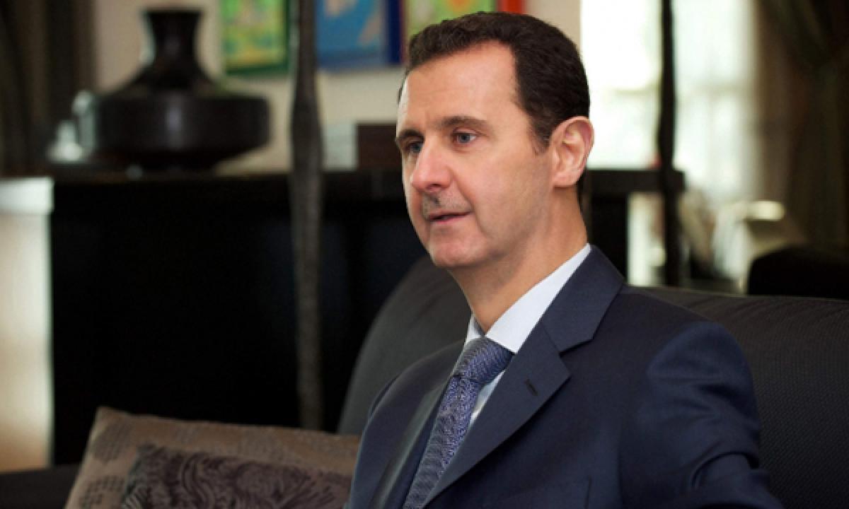 Syrian President says should and wait see if Trump lives up to promises to fight militants