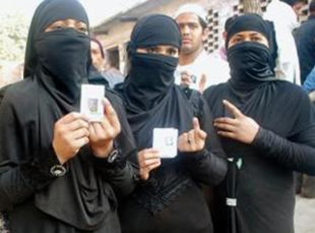 Deploy women police to examine burqa-clad voters: BJP to EC