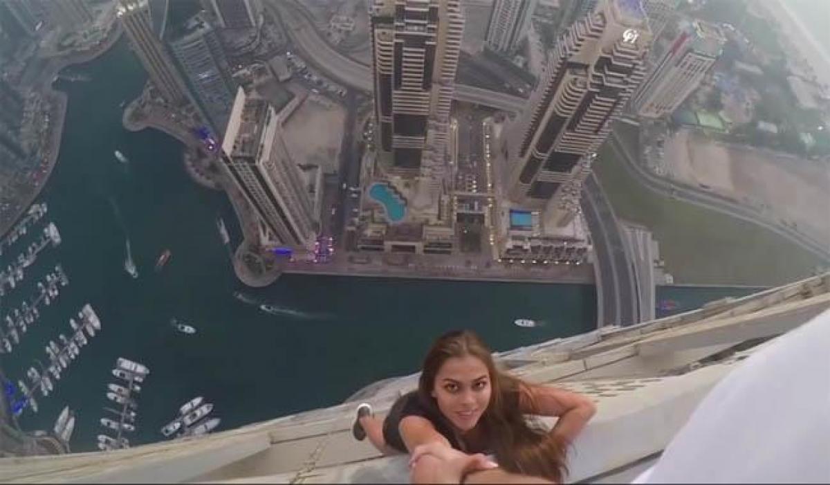 Dubai police summon Russian model who dangled from skyscraper