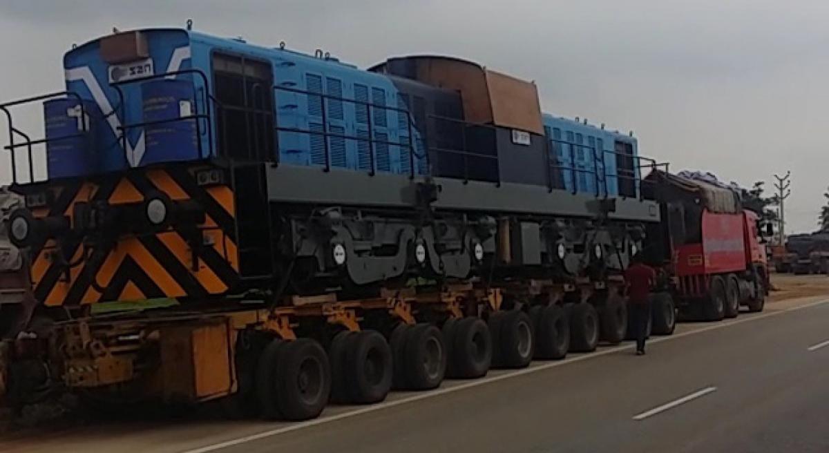 Truck ferrying rail engine runs out of fuel