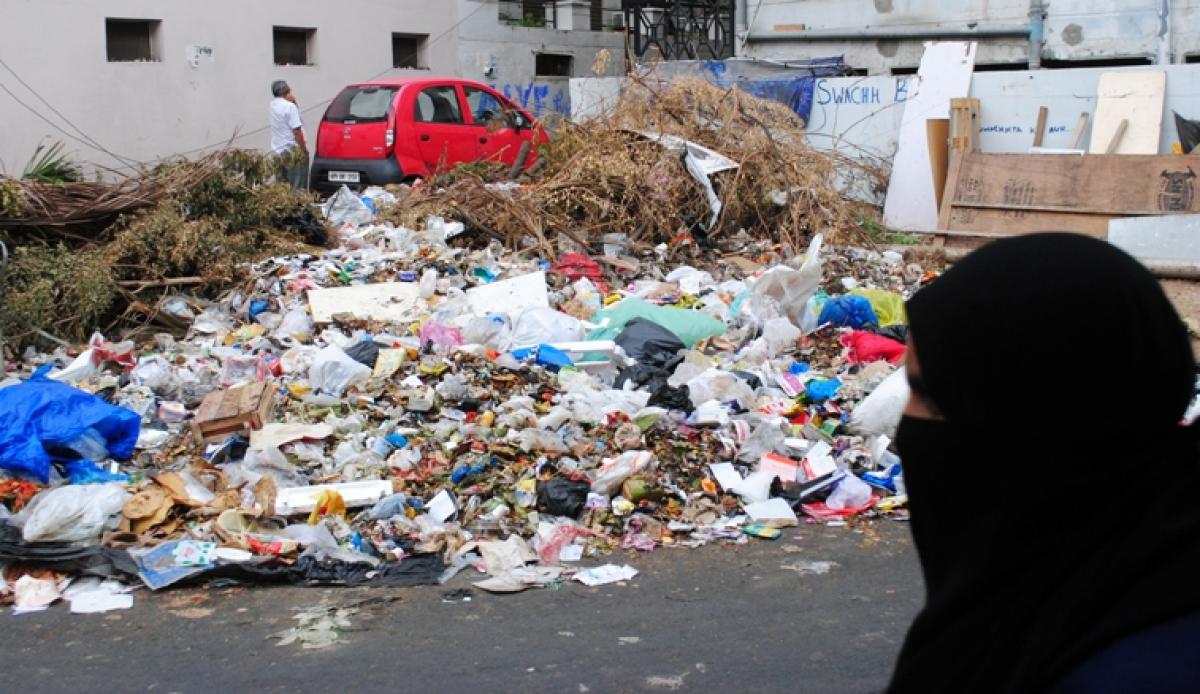 Garbage piles up in city as civic staff strike continues