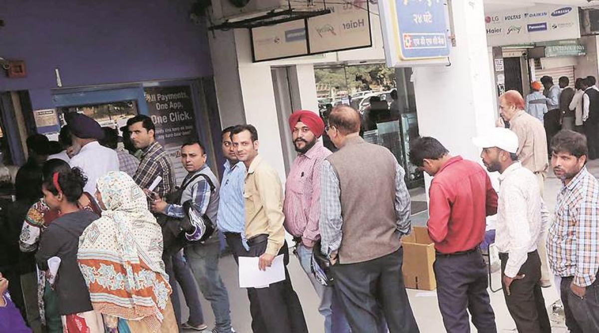 Demonetization: Queues reduce outside banks, ATMs