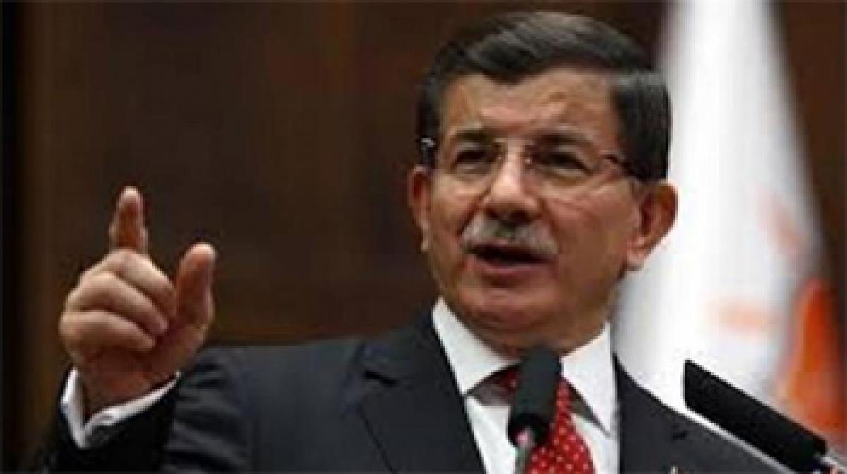 Turkey PM says no bargaining over refugees in EU deal