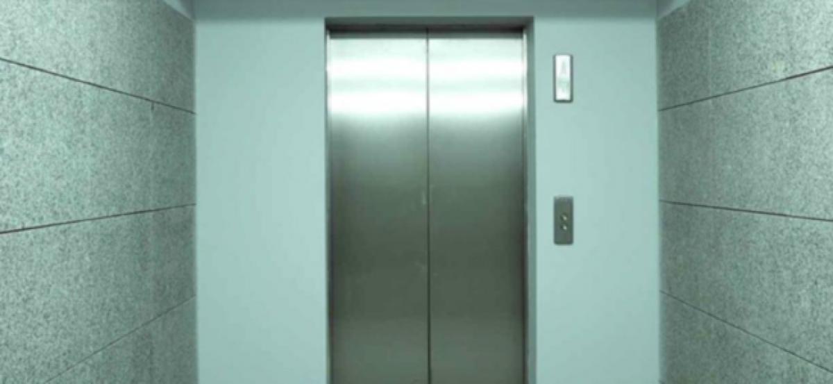 China - Trapped In An Elevator, Woman Found Dead Inside