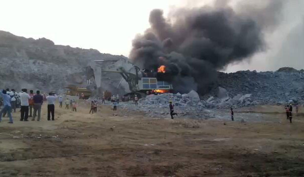 Heavy excavator catches fire at Polavaram site