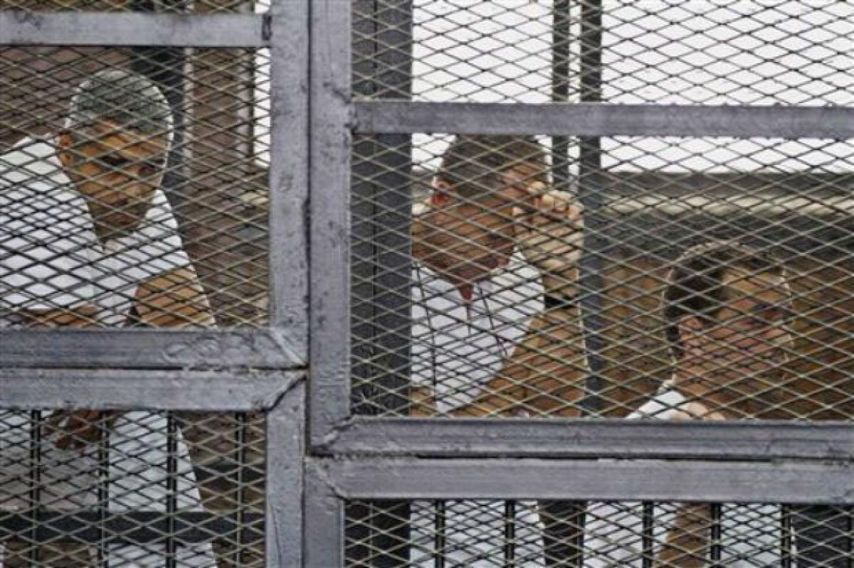 Egypt court again postpones verdict in Al-Jazeera reporters retrial