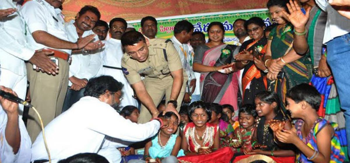 Ear piercing held for orphan girls in Godavarikhani