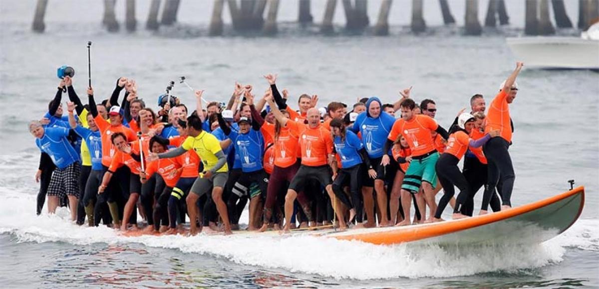 Surf city USA breaks surfing guinness world records® titles