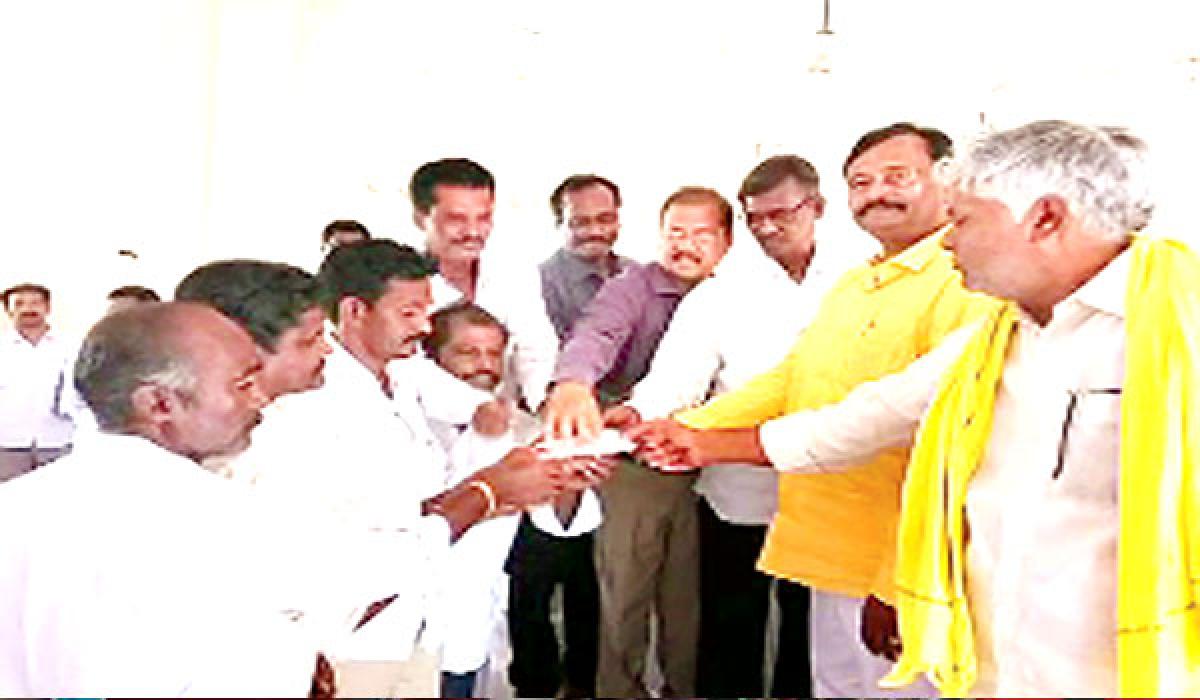 Cheques distributed to farmers