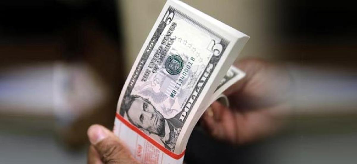 Runaway dollar sends shiver through world markets