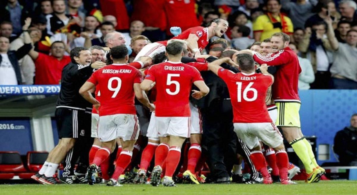 Wales upset Belgium to enter Euro semis.