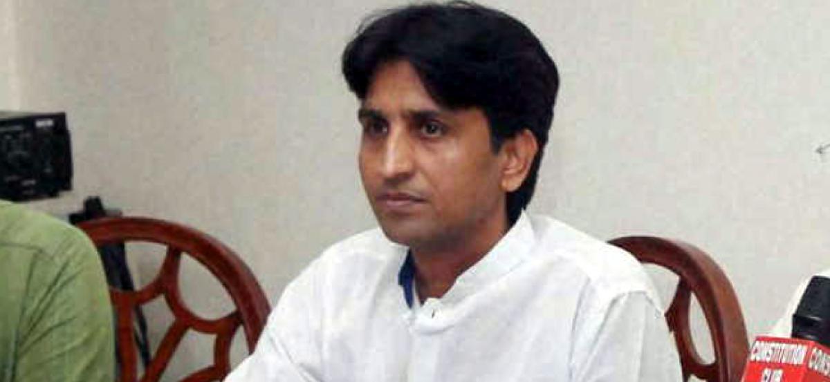 Kumar Vishwas remains in AAP, MLA who took him on suspended