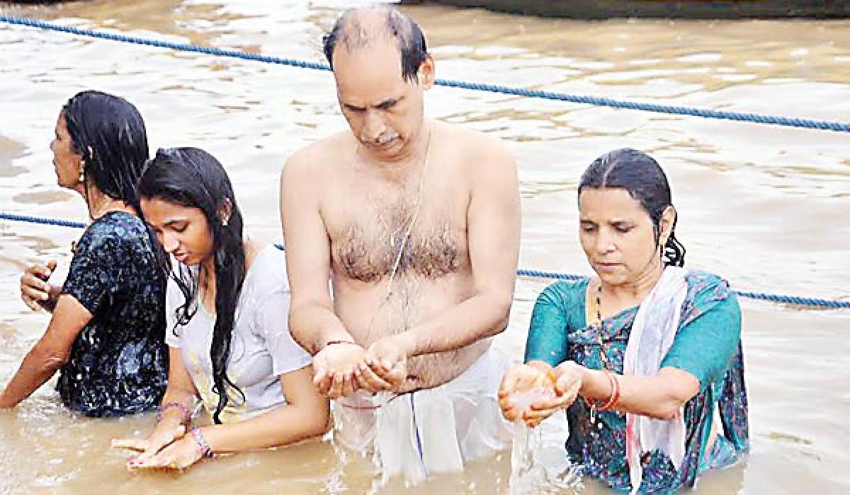 Incessant rains mar holy dips