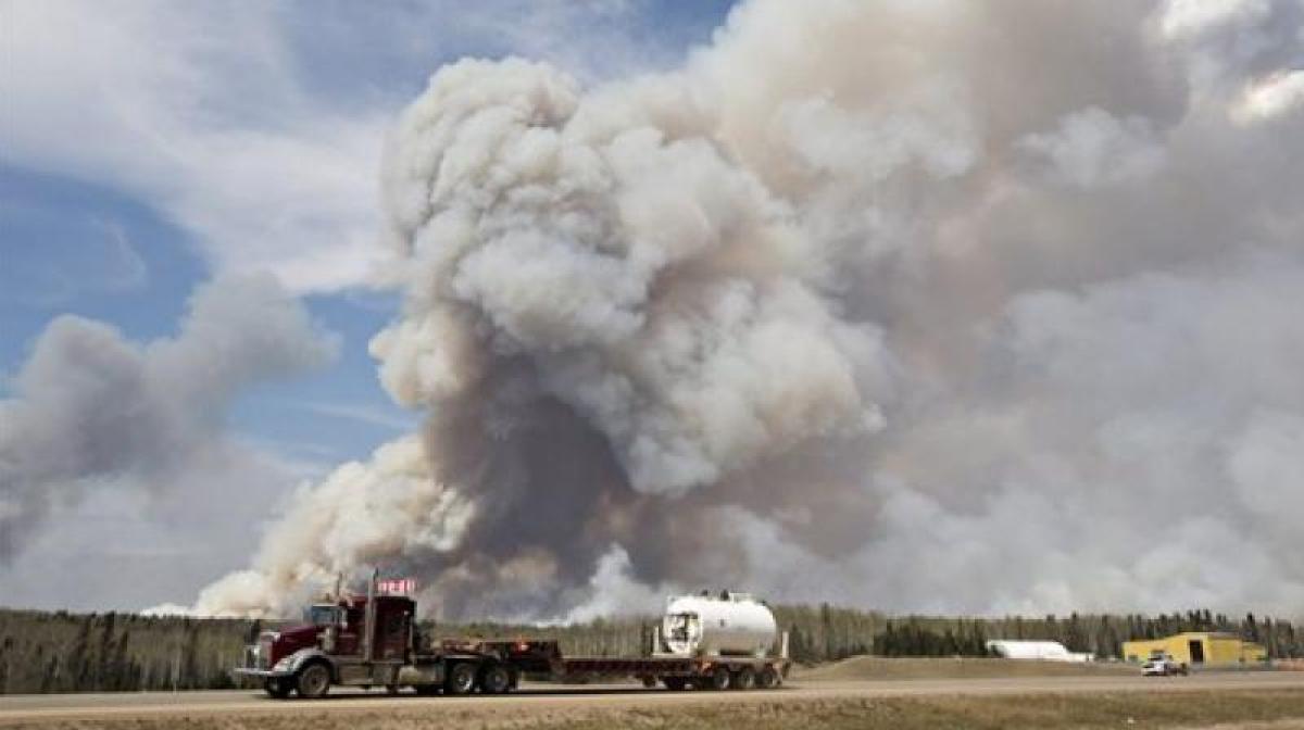 Alberta declares emergency as fires threaten Canada oil town