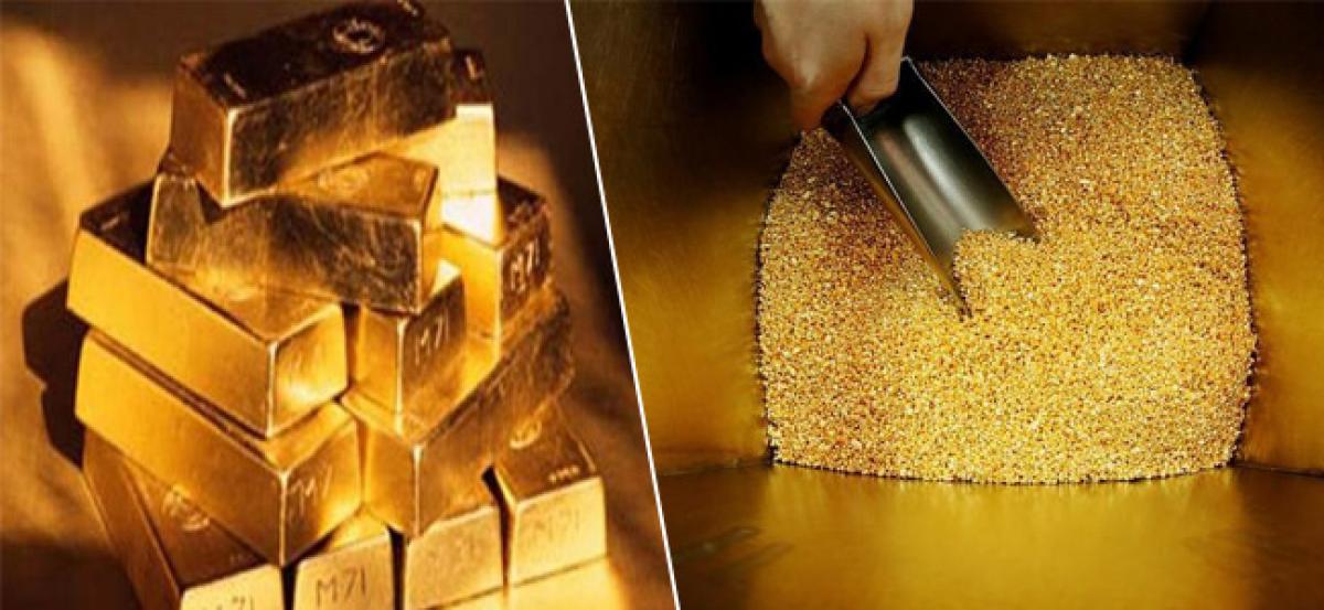 Gold edges up on weaker stocks, dollar ahead of Fed meeting