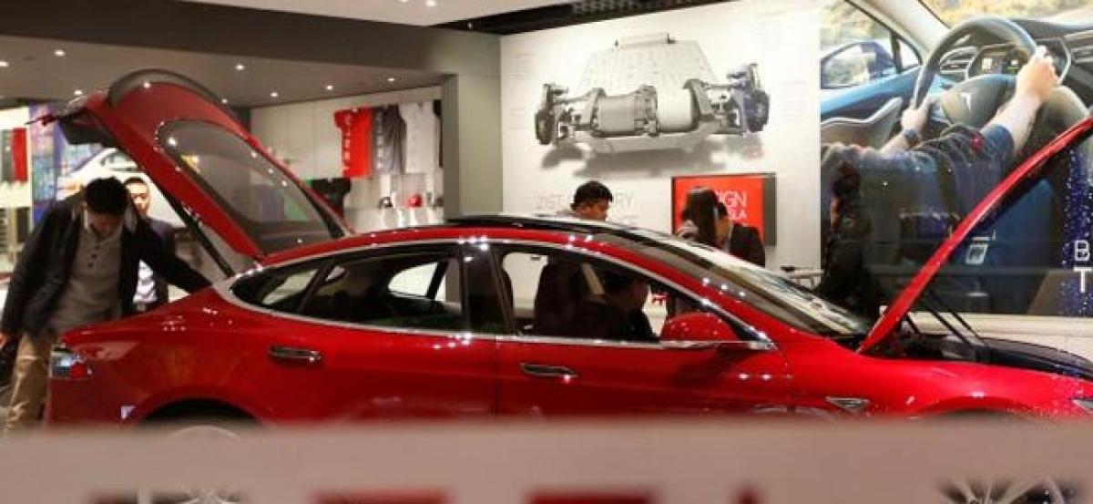 Tesla removes autopilot from China website after Beijing crash