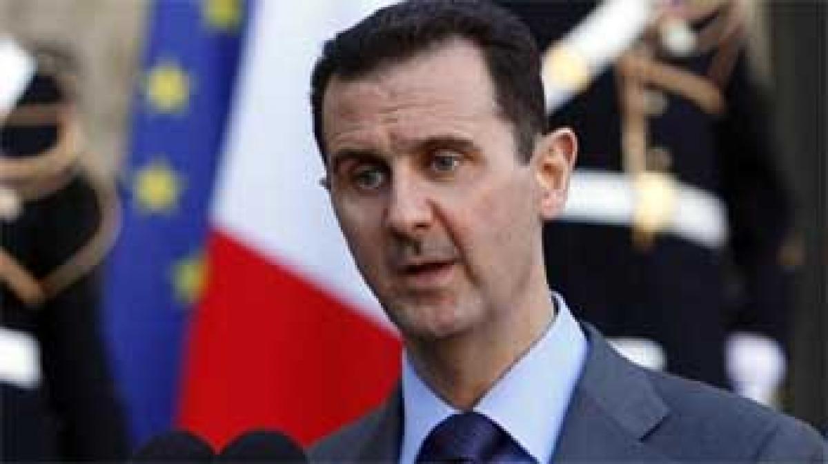 Syrias opposition says Assad must go, dead or alive