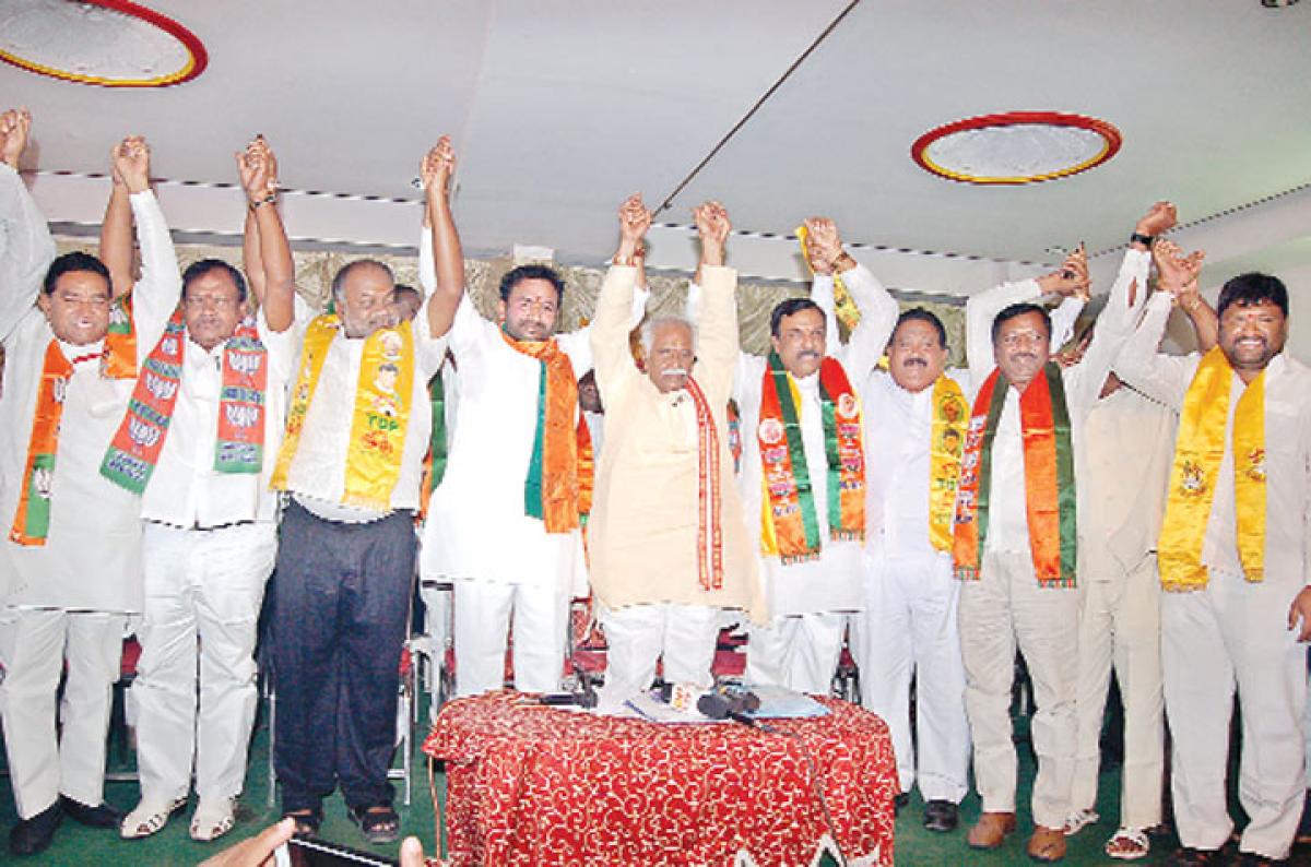 BJP_TDP combine vows to sweep polls