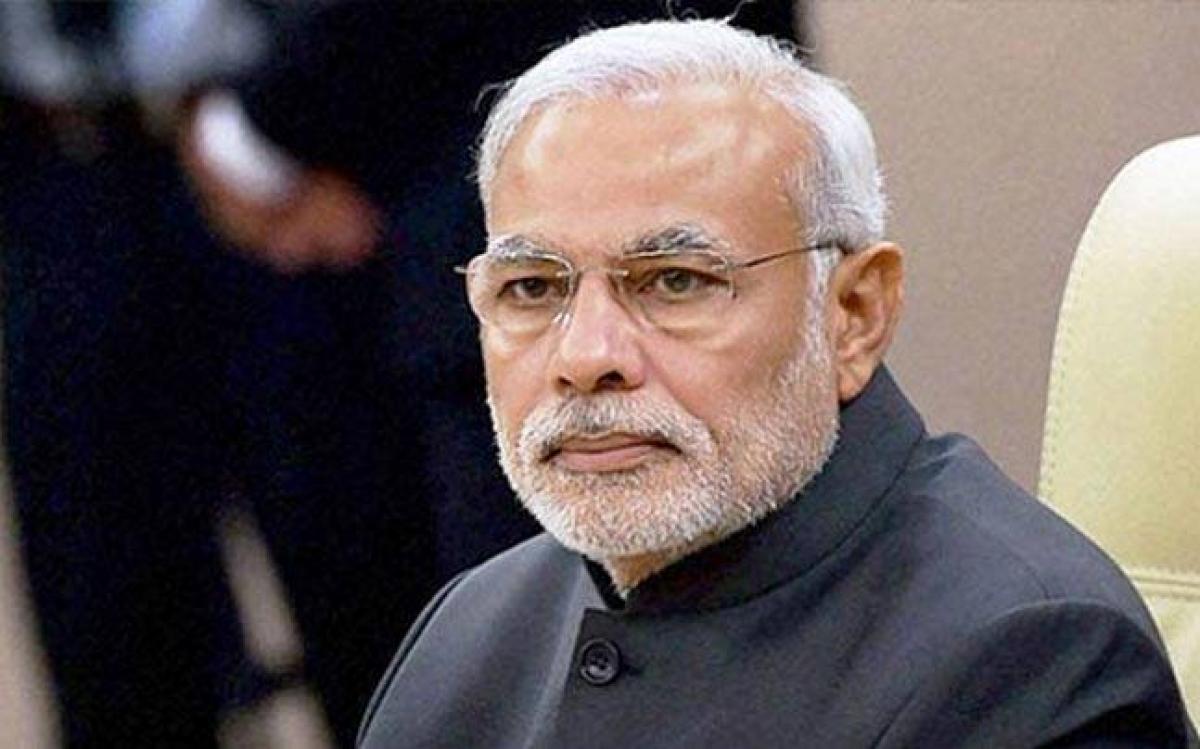 PM Modi aiming for cashless economy, wont roll back demonetization: Naidu