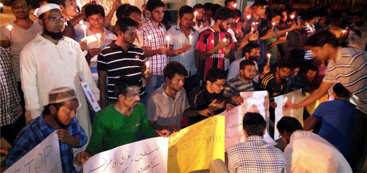 MAANU students hold candle light March to condemn Paris killings