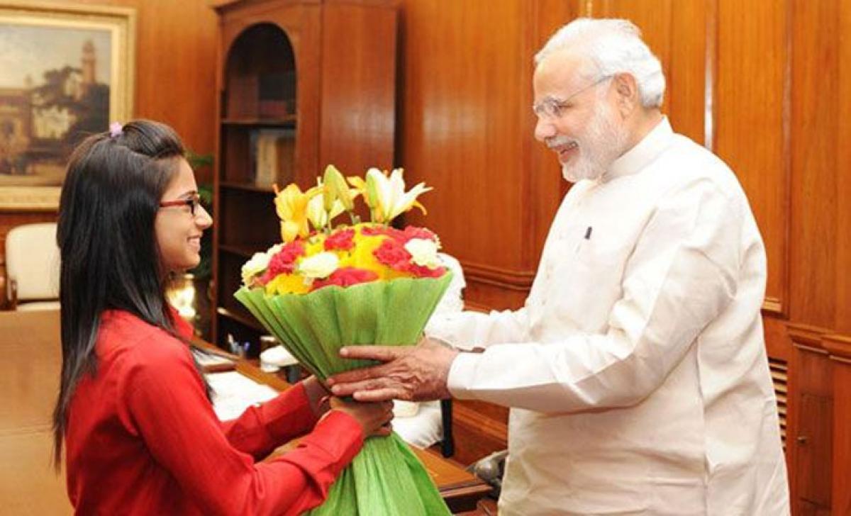 Bhagavad Gita contest winner meets PM Narendra Modi